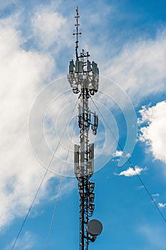 Radio, communication and cell tower on blue sky background. Australia