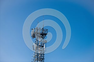 Radio, communication and cell tower on blue sky background. Australia