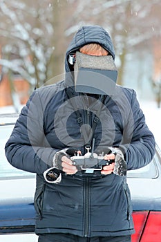 Radio controlled drone operator with FPV mask on his face