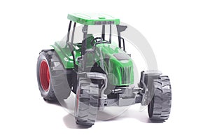 radio-controlled tractor toy isolated on white background