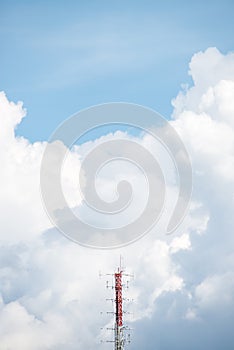 A radio mast with the cloud in background