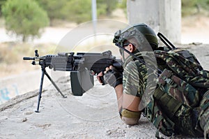 Radio operator gunner M249 light machine gun