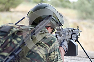 Radio operator gunner M249 light machine gun