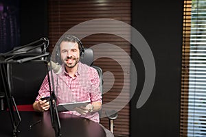 Radio presenter hosting a show