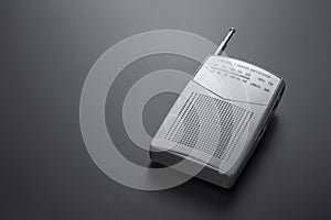 Radio receiver gray on a dark background