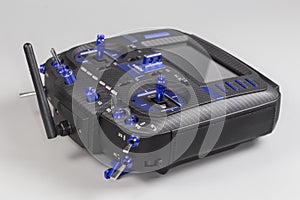 Radio remote control with screen display on a gray background