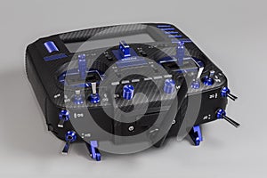 Radio remote control with screen display on a gray background