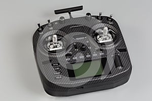 Radio remote control with screen display on a gray background