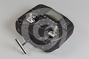 Radio remote control with screen display on a gray background