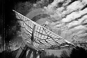 Radio telescope focus to the sky in grunge style