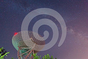 Radio telescope at the night sky