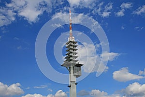 Radio tower in blue sky