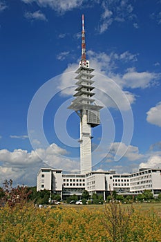 Radio tower in blue sky