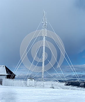 Radio tower on the mountain in winter