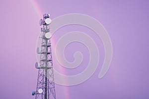 Radio tower in Queensland with a rainbow.