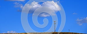 Radio Tower Telecommunications Blue Sky and Clouds