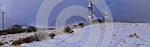 Radio Towers on Lake Mountains Peak via Israel Canyon road in winter, Utah Lake, Wasatch Front Rocky Mountains, Provo