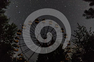 Radioactive ferris wheel at night in Pripyat, Chernobyl zone