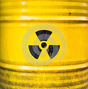 Radioactive sign. Yellow nuclear waste barrel.