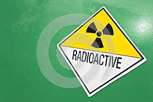 Radioactive Warning Sign on a Green Container