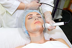 Radiofrequency facelift in a beauty salon.