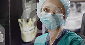 Radiologist Dentist Doctor video portrait at teeth 3D x-ray On Desktop Computer Monitor