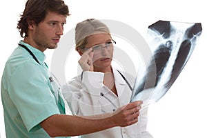 Radiologist showing x-ray to another doctor