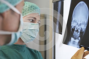 Radiologists Examining Xray Of Skull