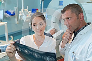 Radiology specialist inspecting result