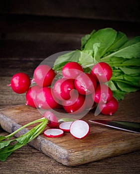 Radishes on kitchen board