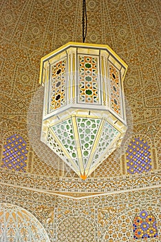 Raditional East lamps on the  painted ceiling patternsin