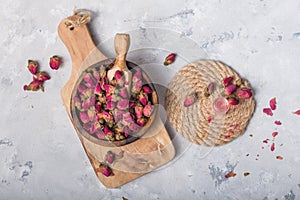 Raditional Turkish rose bud tea on white background. Dry flowers, petals. Healthy lifestyle concept