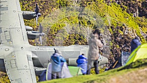 RAF C130 Hercules low level passing aviation enthusiasts photo