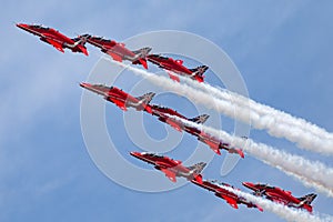 Royal Air Force RAF Red Arrows formation aerobatic display team flying British Aerospace Hawk T.1 Jet trainer aircraft.