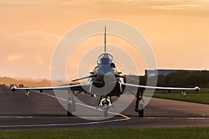 RAF Typhoon taxis out at sunset