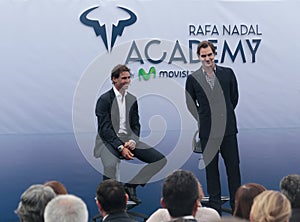 Rafa Nadal and Roger Federer gesturing