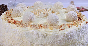 Raffaello cake with coconut flakes and almonds