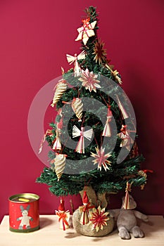 Raffia decorated small Christmas tree