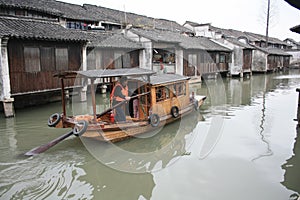 A raft in the river of water town wuzhen in south china