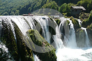 Raft at top of Strbacki Buk Waterfall photo