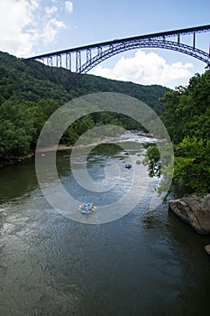 Rafters heading under the New River Gorge Bridge