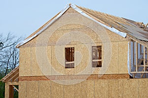 rafters and walls of a plywood house new woodwork work building