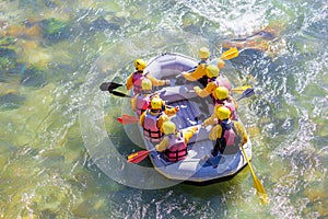 Rafting boat with people top view in arahthos river greece