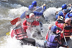 Rafting team splashing