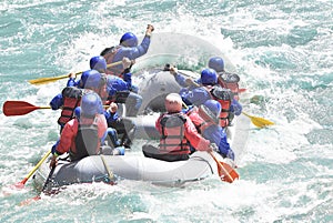 Rafting team splashing