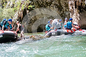 Rafting team stucked on the river photo