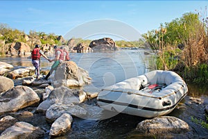 Rafting team , summer extreme water sport.  Group of people in a rafting boat, beautiful adrenaline ride down the Tara river,