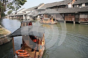 Rafts on the river of water town Wuzhen