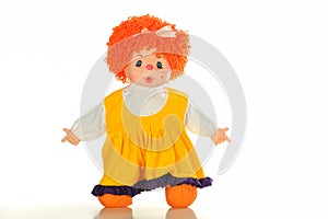 rag doll girl with orange hair in a yellow jumpsuit suit
