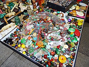 Ragbag of jewelry on a street market in Hong Kong